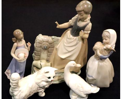 Three Nao figurines including girl with broken water jug, H: 30 cm and a Beswick cat. P&amp;P Group 3 (£25+VAT for the first 