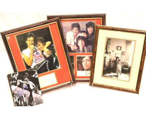 Signed Rolling Stones photographs; Mick Jagger (no CoA) Charlie Watts, Ronnie Wood and Bill Wyman all with CoAs. P&amp;P Grou