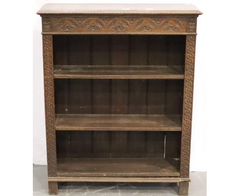 Carved oak three shelf bookcase, 92 x 32 x 114 cm H. Not available for in-house P&amp;P, contact Paul O'Hea at Mailboxes on 0