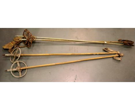 Two pairs of antique ski poles. P&amp;P Group 3 (£25+VAT for the first lot and £5+VAT for subsequent lots) 