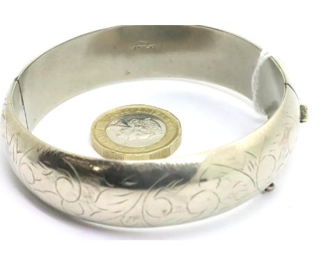 Sterling silver snap bangle, 35g. P&amp;P Group 1 (£14+VAT for the first lot and £1+VAT for subsequent lots) 