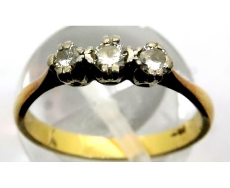 18ct gold ring set with three diamonds, size N, 2.6g. P&amp;P Group 1 (£14+VAT for the first lot and £1+VAT for subsequent lo