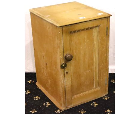 A Victorian stripped pine single door pot cupboard 40 x 46 x 61 cm H, lacking feet and interior shelf. Not available for in-h