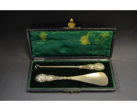 An Edwardian silver hafted button hook and shoe horn, Birmingham 1903, cased