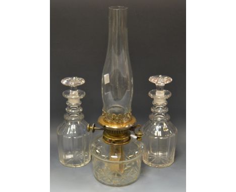 Glass - a Victorian cut glass oil lamp, clear reservoir and chimney, brass Hinks patent adjuster;  a pair of 19th century cut