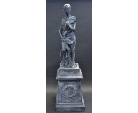 A contemporary classical style lead effect garden model, Allegorical of Autumn, she stands draped in robes holding a bundle o