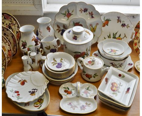 A quantity of Royal Worcester Evesham pattern tableware including quiche dishes, serving dishes, storage jars, teapot, vases;