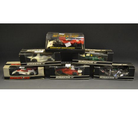 Scalextric - six Formula One cars including a March Ford 721, C026, boxed; a B.R.M P.160, C051, boxed & unused decal sheet; a