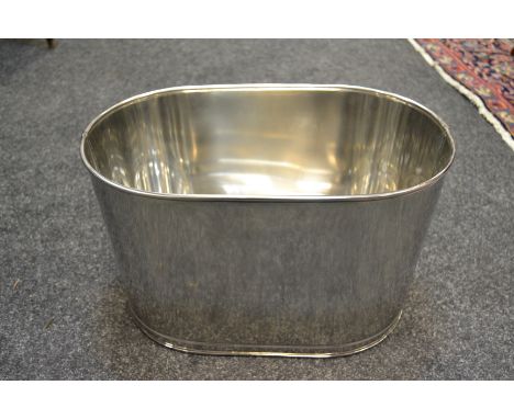 A modern chrome reproduction champagne trough, inscribed with Lily Bollinger quote 'I drink it when I'm happy and when I'm sa