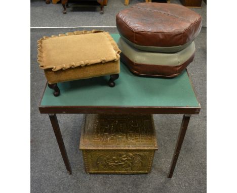 A brass log box, embossed with figures in a tavern, 46cm wide;  a mid 20th century hexagonal pouffe;  a card table;  etc (4)