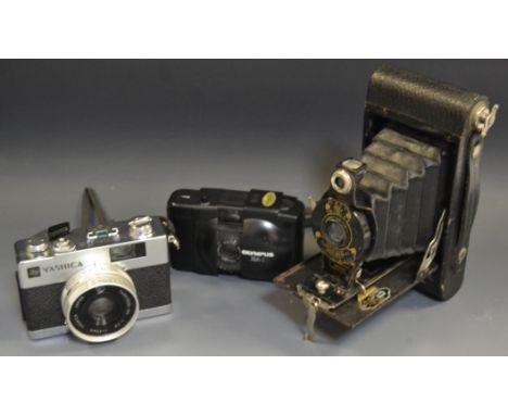 **Please Collect or consign to charity before 20th June 2018**A Yashica Electro 35mm camera; an Olympus XA camera; a Kodak bo