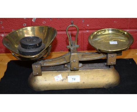 A set of Avery iron scales, with brass pans, to weigh 2lb