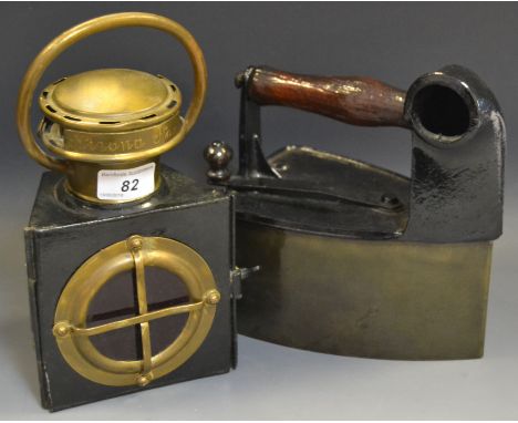 A 19th Century coaching lamp; a flat iron