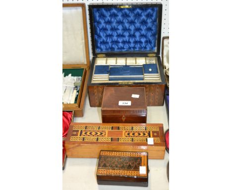 A Victorian walnut work box, c1870; a cribbage board, c1870; a 19th Century mahogany tea caddy c1820 (4)