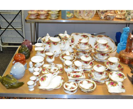 A Royal Albert Old country roses tea and breakfast set; a set of 5 Carlton Ware jars and covers