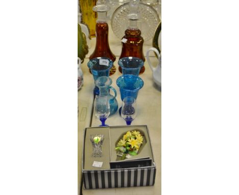 Glassware - a pair of ruby lustre glass decanters; a set of 3 blue glass goblets, bubble inclusions; a Waterford crystal boxe