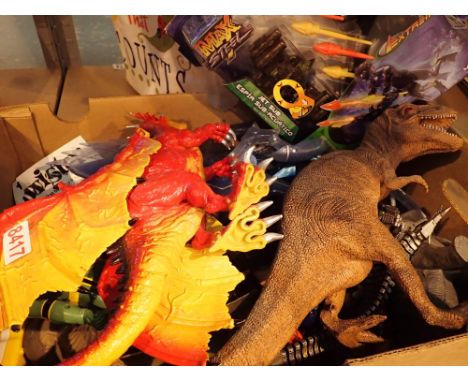 Box of larger scale action figurines including Max Steel Action Man dinosaurs and elephants 