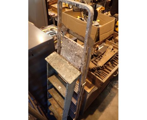 Set of four step aluminium steps and a wooden step ladder