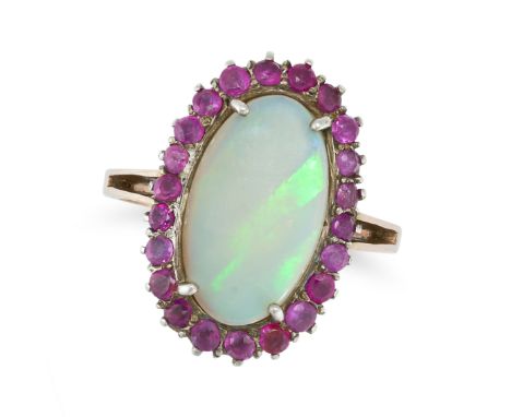 NO RESERVE - AN OPAL AND RUBY CLUSTER RING in rose gold, set with a cabochon opal in a cluster of round cut rubies, no assay 