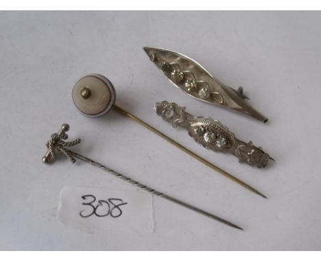 Two silver brooches and 2 stick pins     