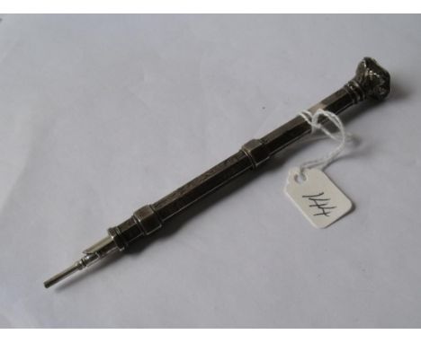 An antique silver scroll engraved propelling pencil and ink dip pen combination with amethyst stone   terminal        
