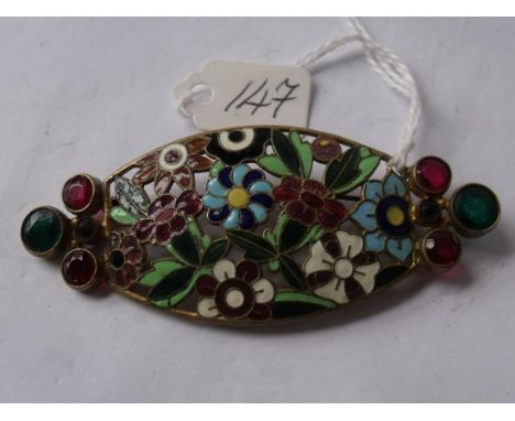 A large stone set enamel brooch depicting summer flowers         
