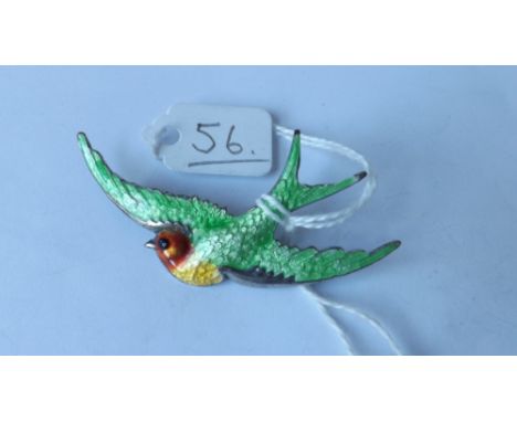 Antique silver and enamel bird brooch.     