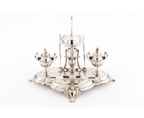 An unusual inkwellPortuguese silverRenaissance style decoration on scalloped, raised and chiselled stand with foliage motifsU