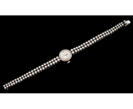 A Movado lady's watchPlatinum 950/1000Case and strap set with 92 brilliant cut (ca. 4.50ct) and 30 8/8 cut diamondsSwitzerlan