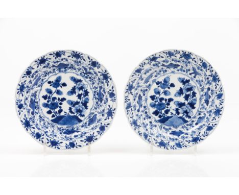 A pair of scalloped platesPorcelainBlue underglaze decoration of foliage and fish decorationChina, Kangxi reign (1662-1722)(m