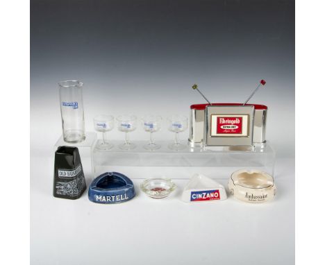 This fantastic collection includes four Seagram's Gin cocktail glasses, a Rheingold bar caddy, a stirrer and olive fork with 