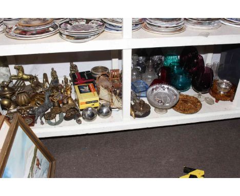 Assorted clear and coloured glass, brass and metalware, horsebrasses, vintage movie camera, etc.