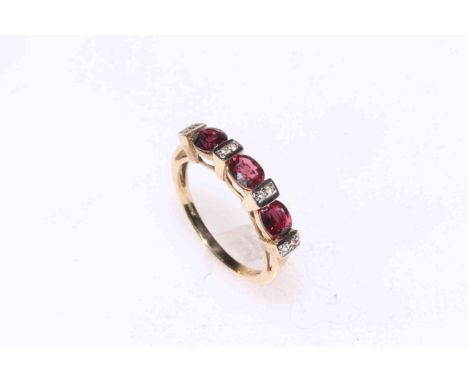 9k gold Malawi ruby and white sapphire ring, size N/O.