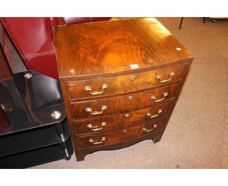 Mahogany four drawer bow front chest, lamp table and tinted glass entertainment unit (3).