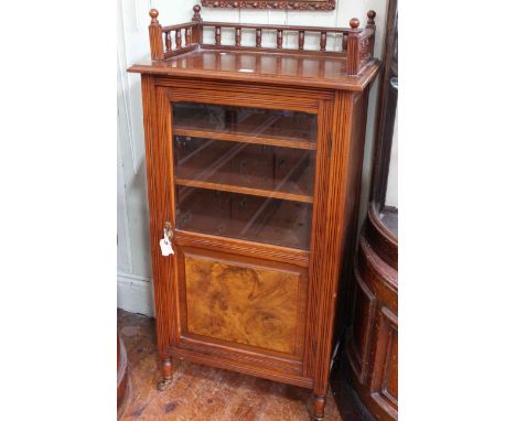 Late 19th/early 20th Century walnut glazed panel door music cabinet, 117cm high by 59cm wide by 38cm deep.