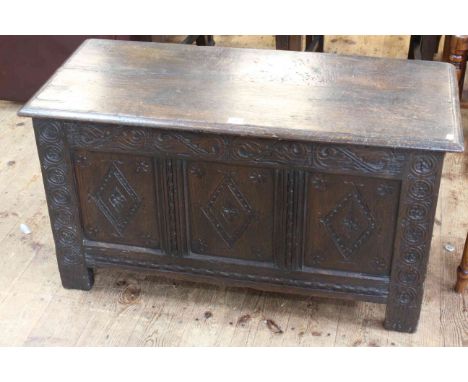 Carved oak triple panel front coffer, 51cm high by 92cm wide by 40cm deep.