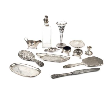 A pair of 18th century Irish silver circular salts, on pad feet, marks partly worn, an Irish silver snuffer's tray with pierc