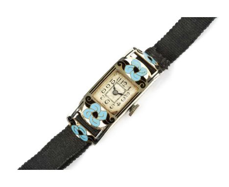 An enamel cocktail watch, the rectangular silvered dial with stylised black Arabic numerals, to a bi-colour case heightened w