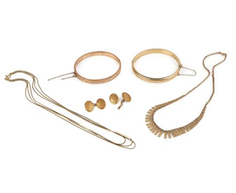 Two 9ct gold bangles, each of hinged oval form, with foliate engraved decoration, together with a pair of 15ct gold cufflinks
