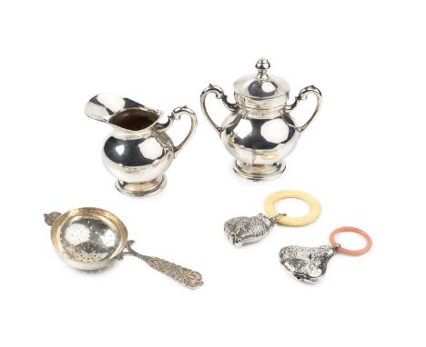 A Peruvian silver sucrier and cover, and matching milk jug, the sucrier with twin handles, both stamped Industria Peruana 925