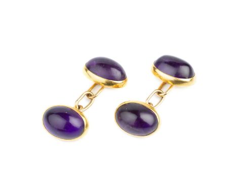 A pair of amethyst cufflinks, each with a pair of oval cabochon amethysts in closed-back collet settings, on chain-link fitti