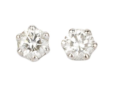 A pair of diamond single stone ear studs, each round brilliant-cut diamond in claw setting, on post fittings, white precious 