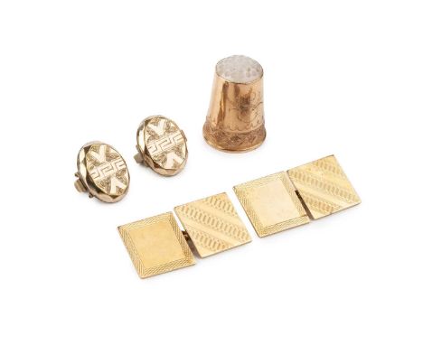 A pair of cufflinks, each square panel with engine-turned decoration, on chain-link fittings, stamped '18CT', together with a