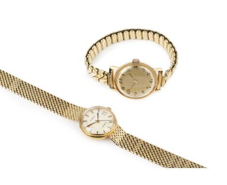 A yellow precious metal bracelet watch, the circular silvered dial with baton markers and date display at 3, signed DUGENA, t