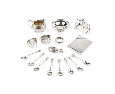 A collection of silver items, comprising a late Victorian milk jug with lobed and embossed decoration, by James Dixon &amp; S