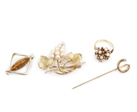 A collection of jewellery, comprising a cultured pearl abstract cluster ring, stamped '9ct', a tiger's eye set panel brooch, 