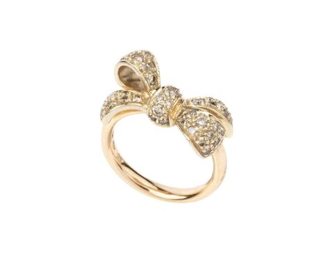 A diamond set 'Forever' bow ring by Pomellato, modelled as a tied ribbon bow of pavé set graduated round brilliant-cut diamon