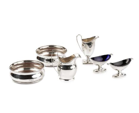 A pair of Edwardian silver oval salts, with reeded borders and oval pedestal bases, blue glass liners, by Charles Stuart Harr