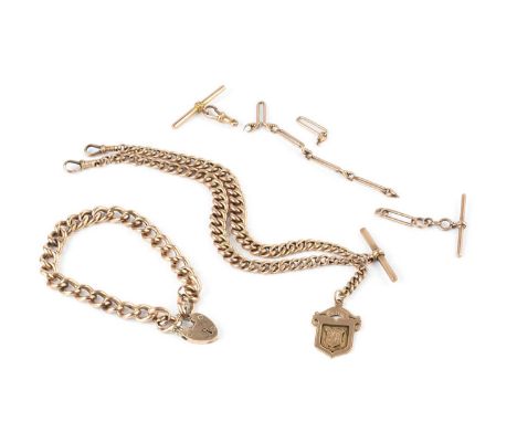 An Albert chain, of graduated hollow curb-link design, stamped '9C', suspending a T-bar and a 9ct gold shield-shaped fob pend