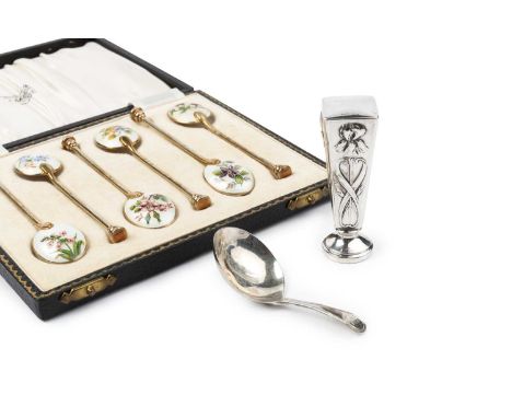 A set of six silver-gilt and enamel coffee spoons, the white enamel bowls painted with floral sprays, by William Suckling Ltd